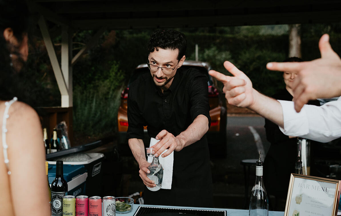 Untitled Simple Bar team providing professional bar service with a customized drink menu.